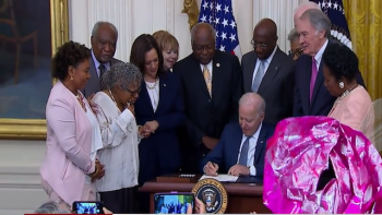   US President Joe Biden signs  the Juneteenth National Holiday bill with  Opal Lee attending, June 17 2021